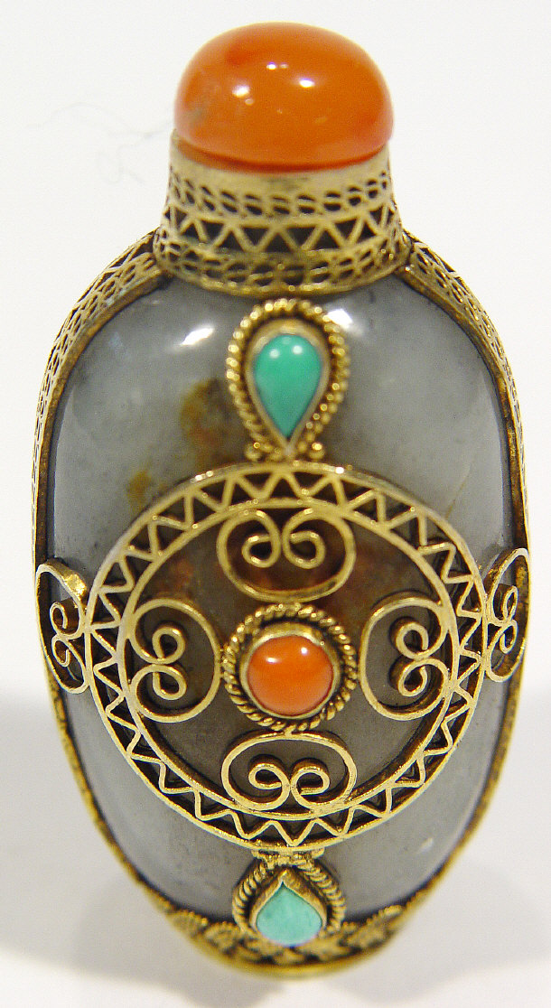 Appraisal: Chinese jade snuff bottle with coral stopper and gilt filigree