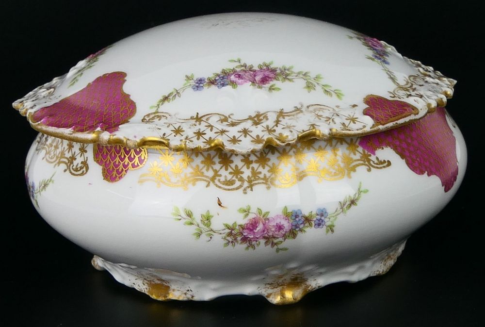 Appraisal: ANTIQUE LIMOGE HAND PAINTED COVERED DRESSER JAR Measures wide dates