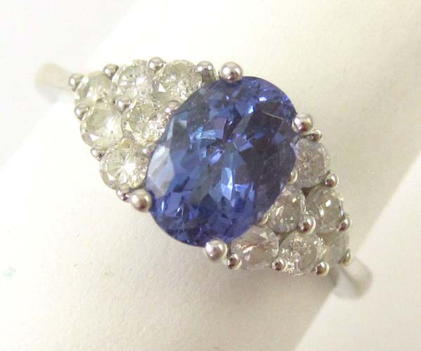 Appraisal: TANZANITE DIAMOND AND FOURTEEN KARAT WHITE GOLD RING with six