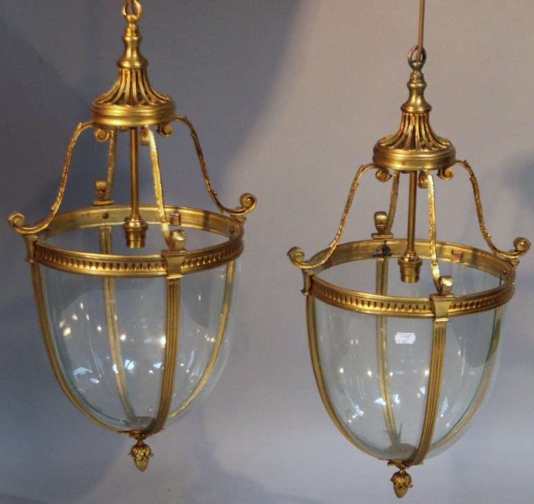 Appraisal: A pair of Regency style gilt metal hall lanterns each