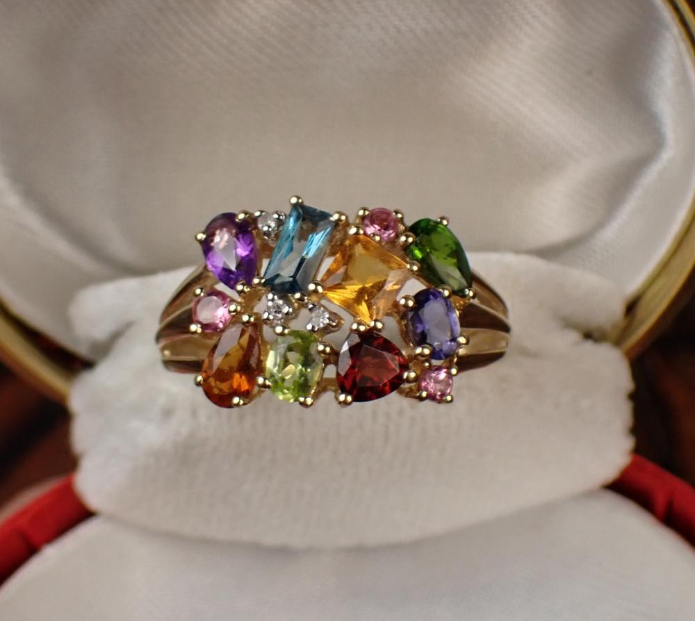 Appraisal: MULTI-COLOR GEMSTONE AND FOURTEEN KARAT GOLD RING set with three