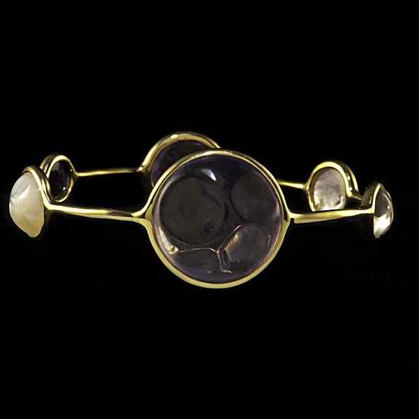 Appraisal: Ippolita k Faceted Stones Bangle Ippolita k yellow gold bangle