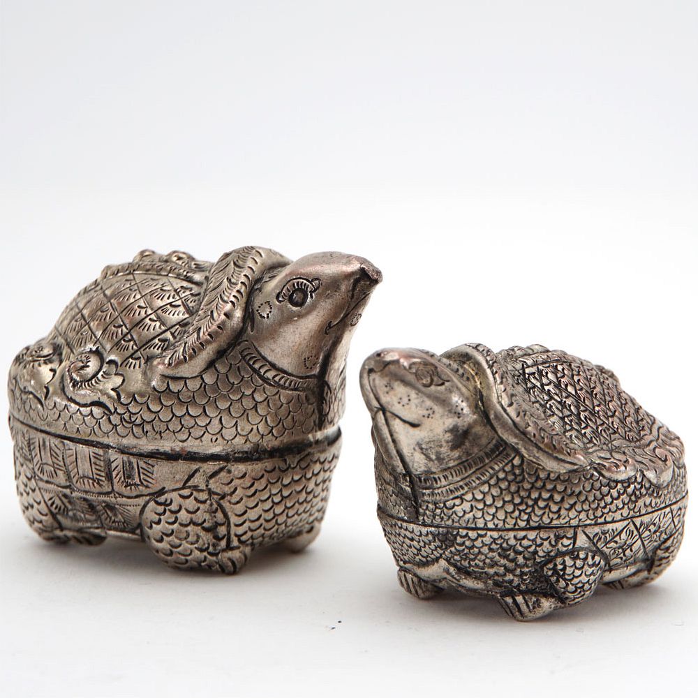 Appraisal: Silver Turtles Silver turtles Two Khmer betel nut boxes One