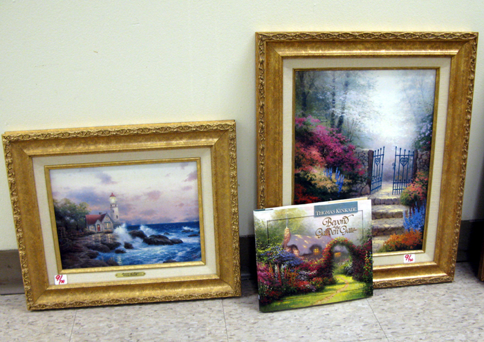 Appraisal: THOMAS KINKADE two color prints on canvas laid down on