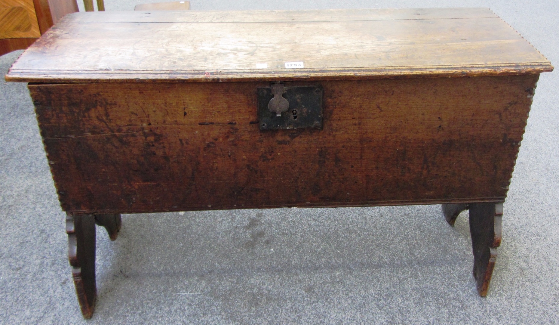 Appraisal: A th century oak plank coffer with chip work decoration