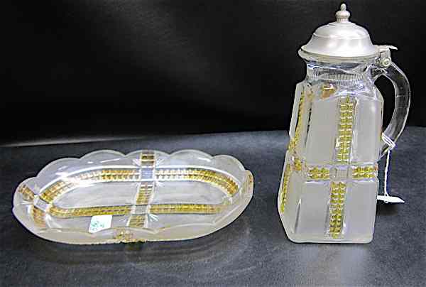 Appraisal: KLONDIKE GLASS SYRUP PITCHER AND MATCHING RELISH BOWL the pitcher