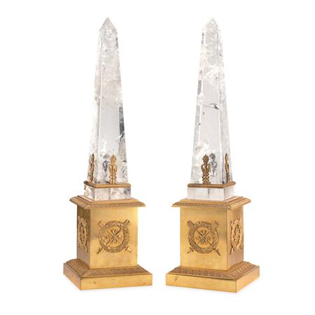 Appraisal: Pair of Empire Style Gilt-Bronze and Rock Crystal Obelisks Estimate