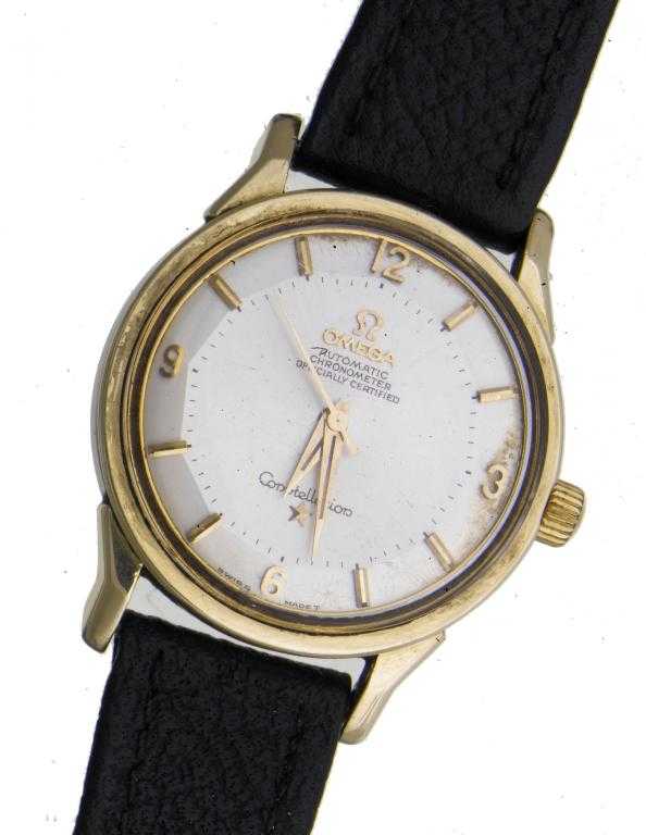 Appraisal: AN OMEGA GOLD PLATED AND STAINLESS STEEL CONSTELLATION WRISTWATCH calibre