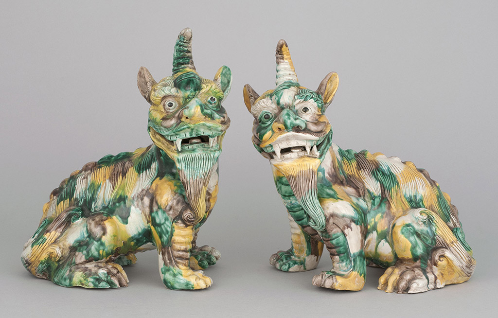 Appraisal: PAIR OF SPINACH AND EGG GLAZE PORCELAIN FIGURES th CenturyIn