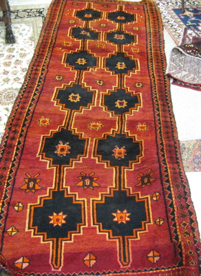 Appraisal: PERSIAN KURDISH AREA RUG with two columns of six black