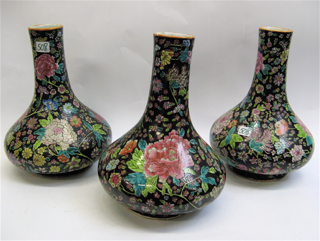 Appraisal: SET OF THREE CHINESE FAMILE NOIRE VASES modified bulbous bottle