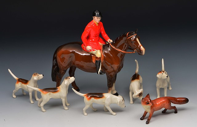 Appraisal: Beswick Huntsmanwith five hounds and a fox