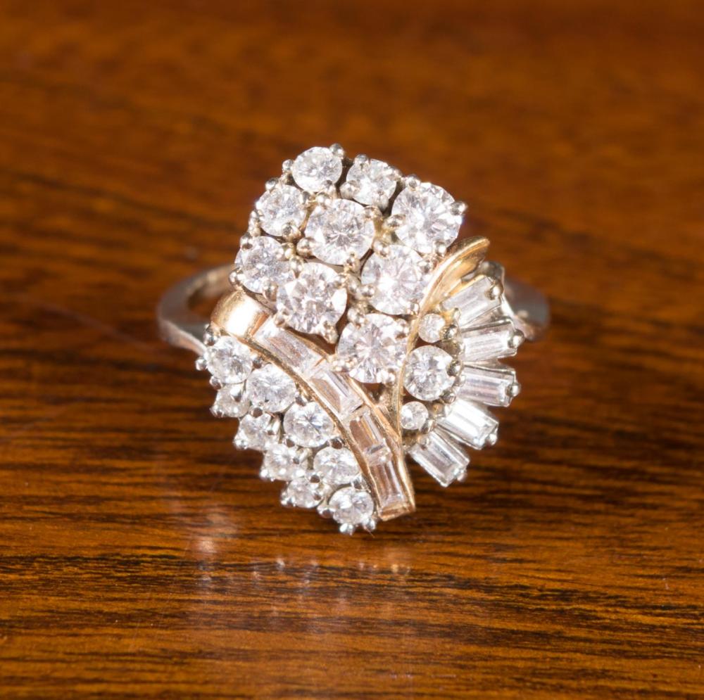 Appraisal: DIAMOND AND FOURTEEN KARAT GOLD CLUSTER RING set with round-cut