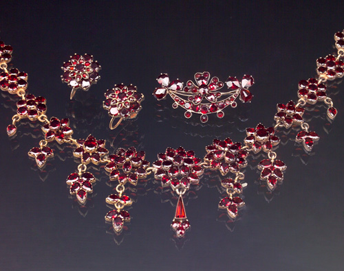 Appraisal: 's BOHEMIAN Garnet festoon necklace with earrings and brooch en