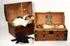 Appraisal: DOLL TRUNKS WITH ACCESSORIES - Lot of two circa -