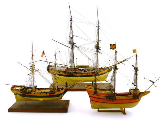 Appraisal: Three th C wooden ship models first double-masted frigate Fair