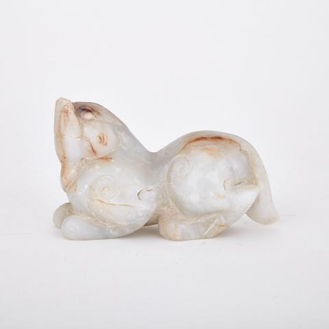 Appraisal: Mottled White Jade Bixie The polished white-grey stone with brown