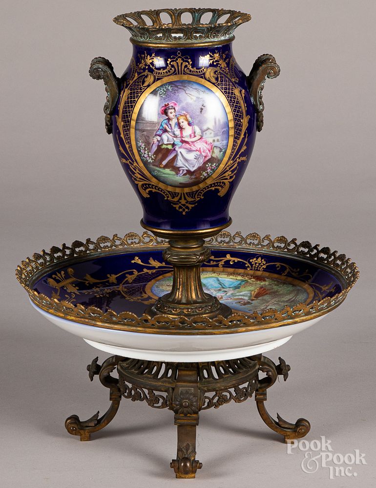 Appraisal: Sevres brass mounted porcelain centerpiece Sevres brass mounted porcelain centerpiece