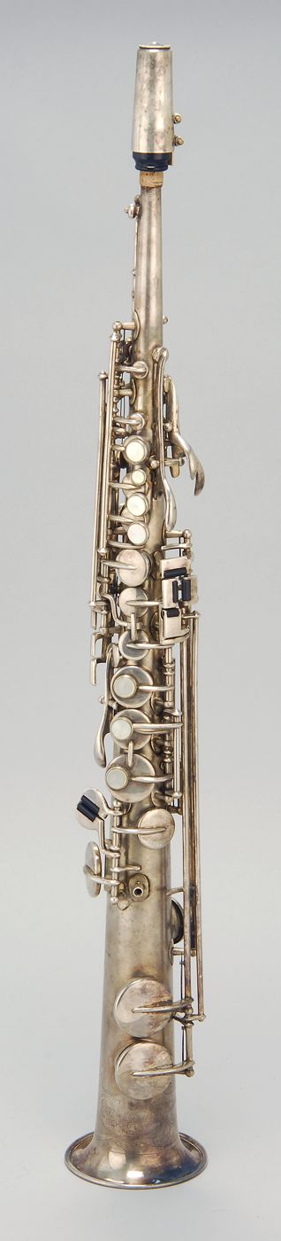 Appraisal: BUESCHER TRUE-TONE LOW-PITCH SOPRANO SAX Circa Satin and polished silver