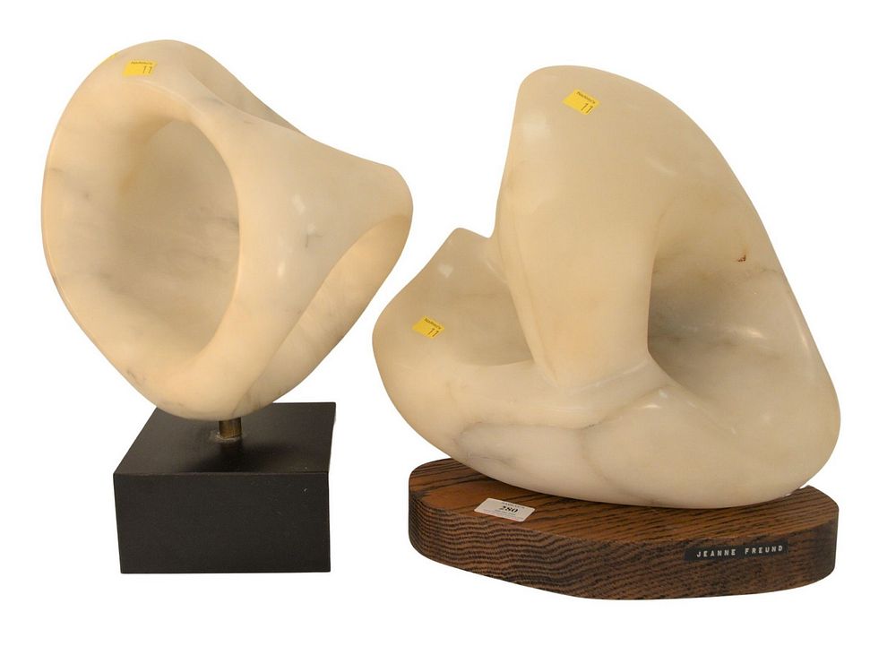 Appraisal: Two Freeform Carved Marble Sculptures both pierced and carved on