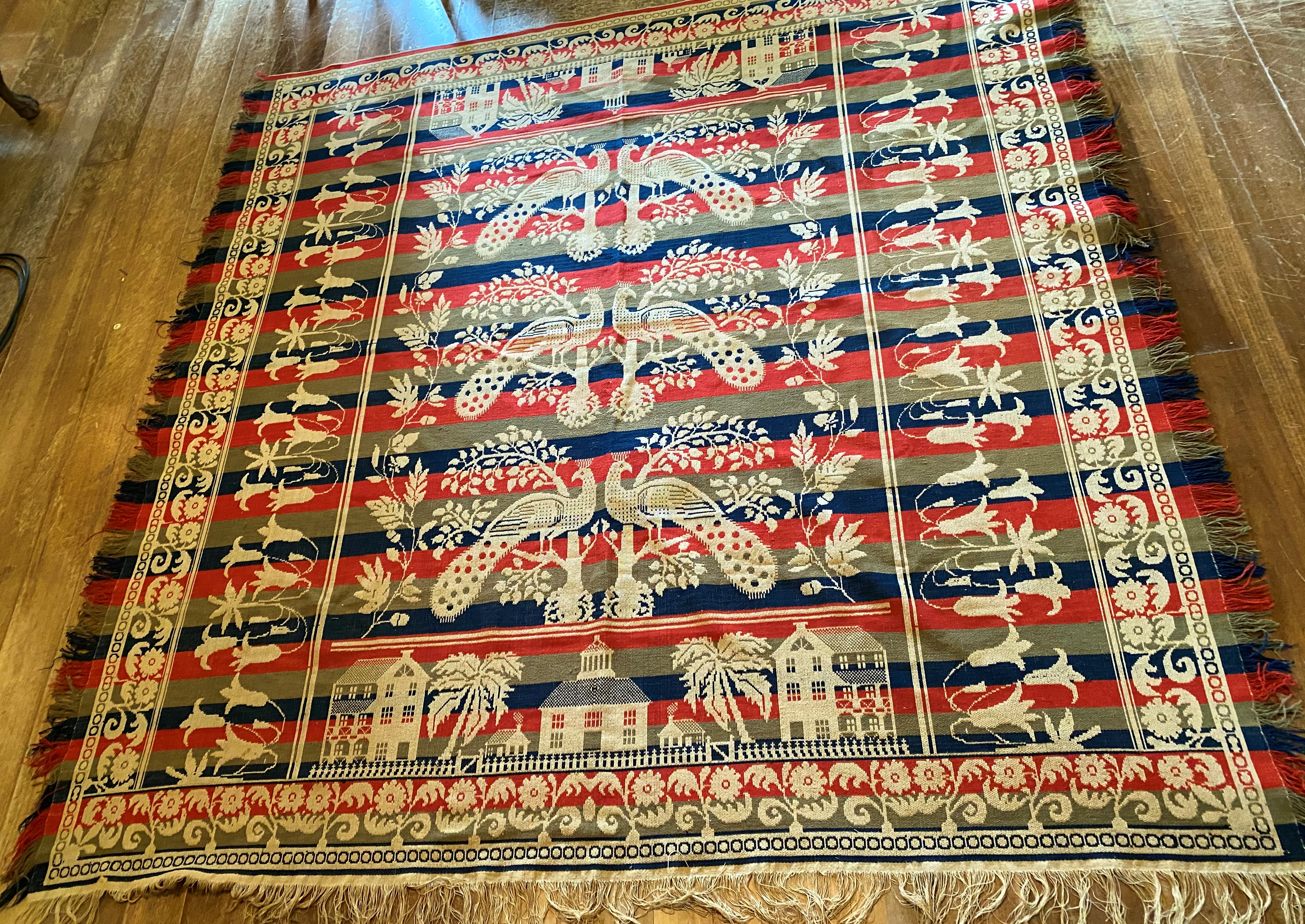 Appraisal: th c Jacquard coverlet in red green blue and natural