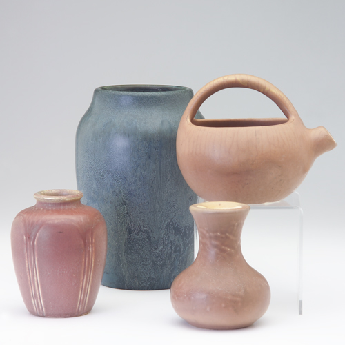 Appraisal: HAMPSHIRE Four vases three covered in matte mauve glaze and