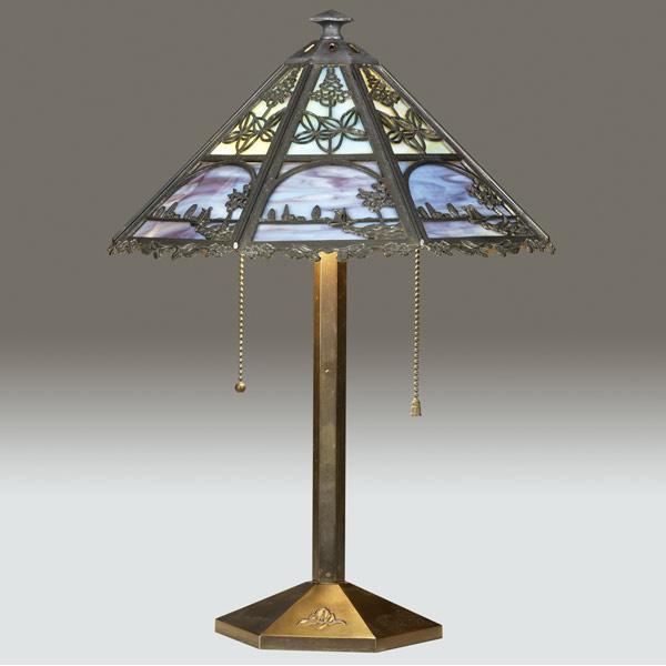 Appraisal: BRADLEY HUBBARD Faceted patinated table lamp its shade lined in