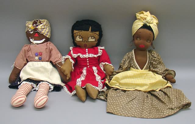 Appraisal: Lot of handmade black cloth dolls Mammy style half doll