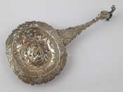 Appraisal: A continental Victorian silver pierced sifter spoon with Sterling import