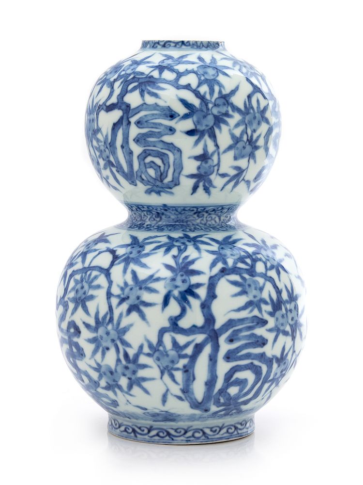 Appraisal: A Chinese Blue and White Gourd-Form Porcelain Vase Height in