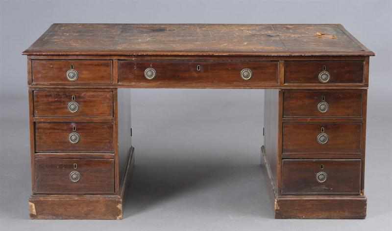 Appraisal: GEORGE III STYLE MAHOGANY PARTNER'S DESK The top with tooled