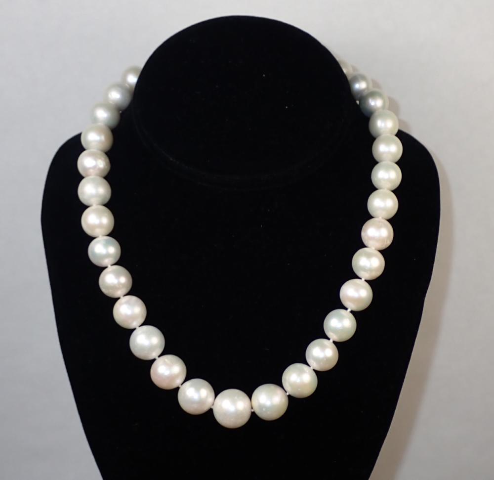 Appraisal: SOUTH SEA PEARL AND EIGHTEEN KARAT GOLD NECKLACE - hand-knotted