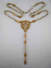 Appraisal: An carat gold and untested baroque pearl pendant necklace probably