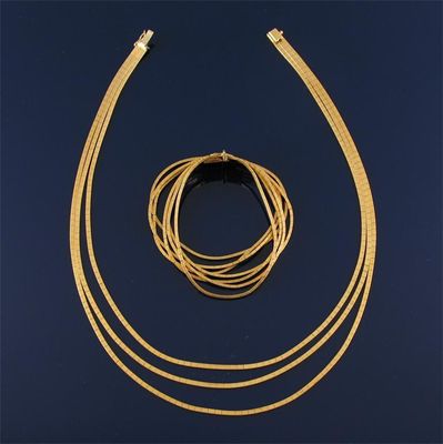 Appraisal: An ct gold polished rectangular section three row necklace and