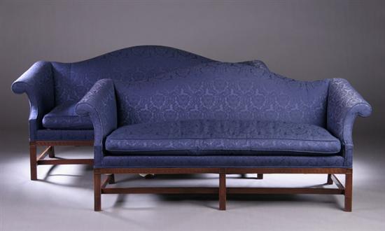 Appraisal: PAIR AMERICAN CHIPPENDALE-STYLE CAMEL-BACK SOFAS Late th century Serpentine padded