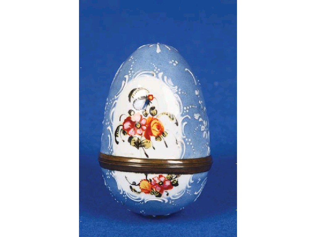 Appraisal: A CONTINENTAL ENAMEL EGG-SHAPED NUTMEG GRATER with a screw dome