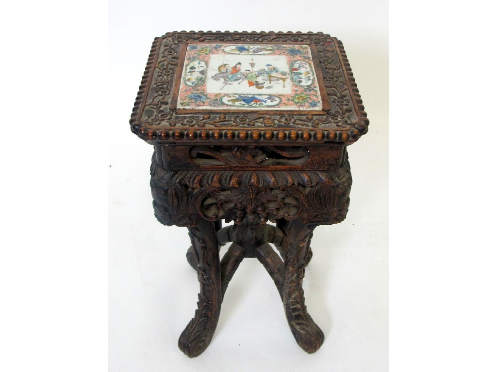 Appraisal: A Chinese hardwood plant stand with a Canton famille rose