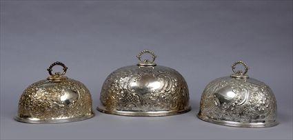 Appraisal: THREE ENGLISH SILVER-PLATED GRADUATED MEAT DISH DOMES Marked J H