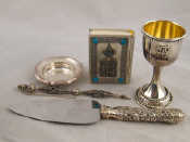 Appraisal: Judaica A silver kiddush cup marked a silver Torah pointer