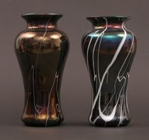 Appraisal: Pair of Iridescent Swirl Vases Pair of iridescent glass vases