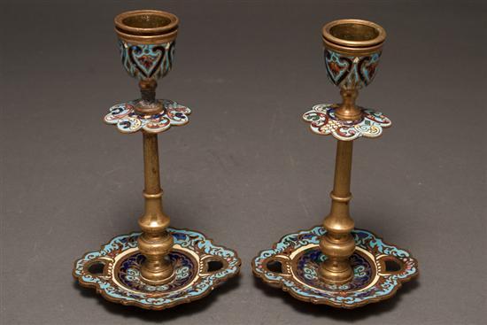 Appraisal: Pair of Continental champleve enamel and brass candlesticks fourth quarter-