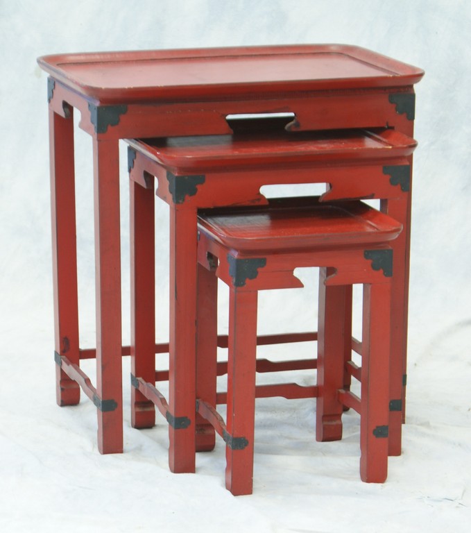 Appraisal: Nest of Asian style red lacquer tables with tray tops