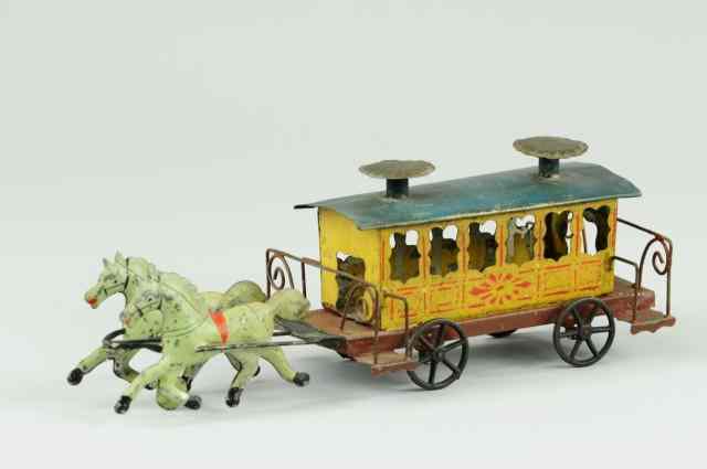 Appraisal: CITY TROLLEY Stevens Brown painted and stenciled tin floor toy