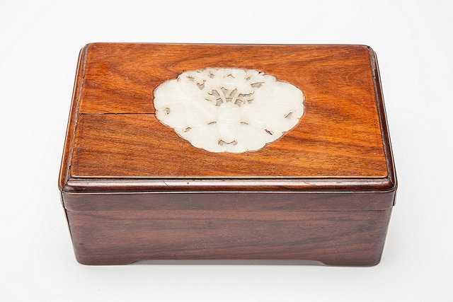 Appraisal: A CHINESE HUANGHALI RECTANGULAR CIGAR BOX with inset jade butterfly