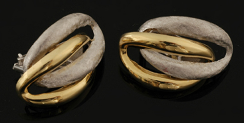 Appraisal: A pair of gold earrings by Bucherer Of double oval