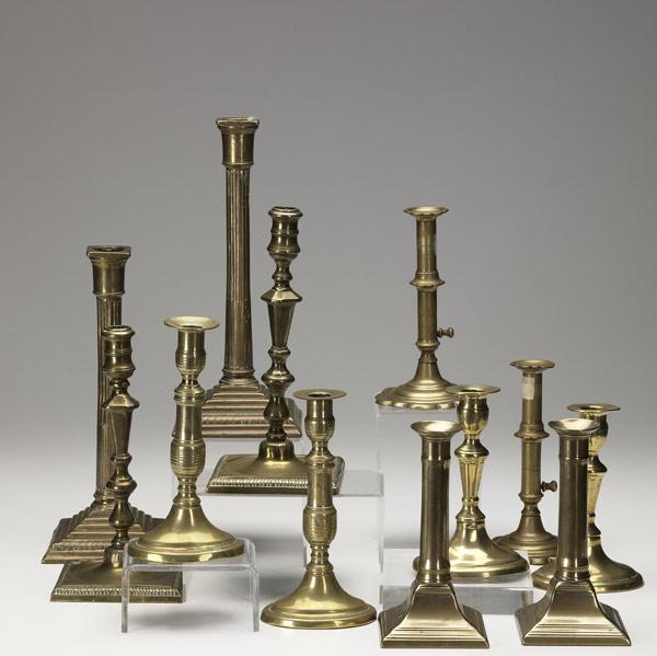 Appraisal: English brass bell metal candlesticks th C Six pairs in