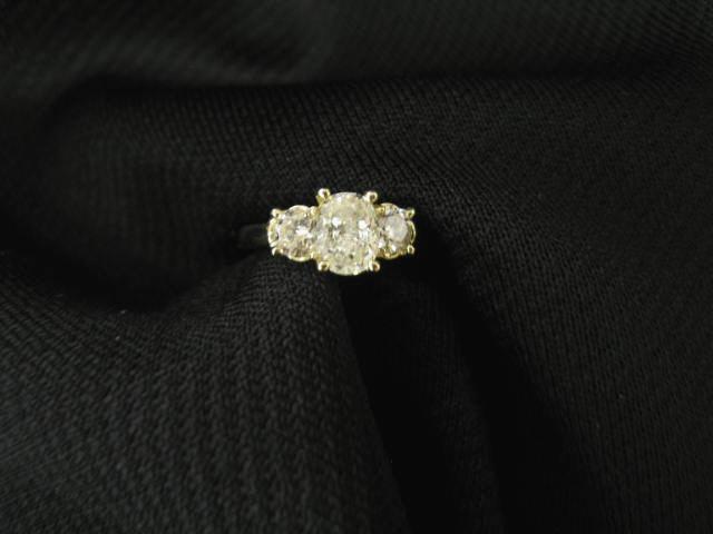 Appraisal: Diamond Stone Ring carat oval diamond with on each side