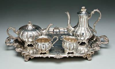 Appraisal: Four piece English silver tea service round melon bodies dome