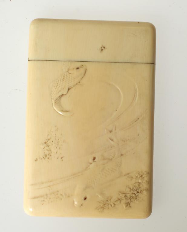 Appraisal: JAPANESE IVORY CARD CASE c of rectangular form with pull-off