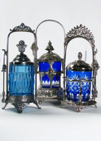 Appraisal: Three Blue Glass Pickle Caster Sets including unmarked caster with